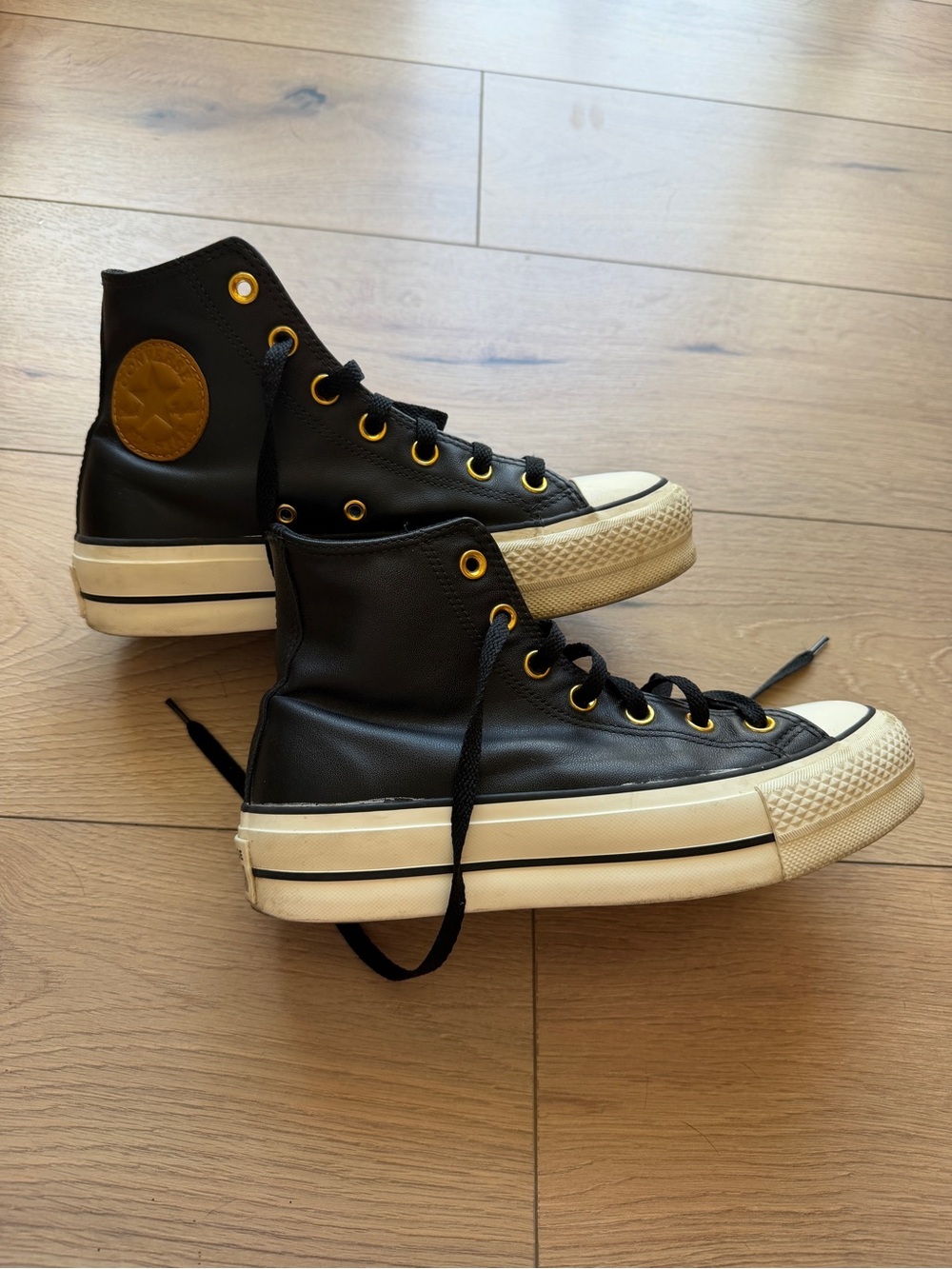 Converse Black High-Top Sneakers with Gold Accents